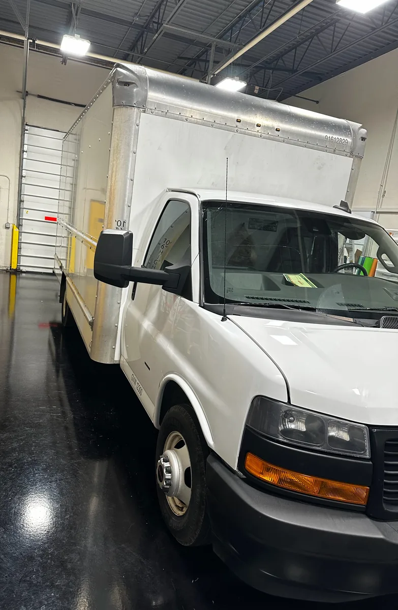 Plain white box truck before its fleet wrap