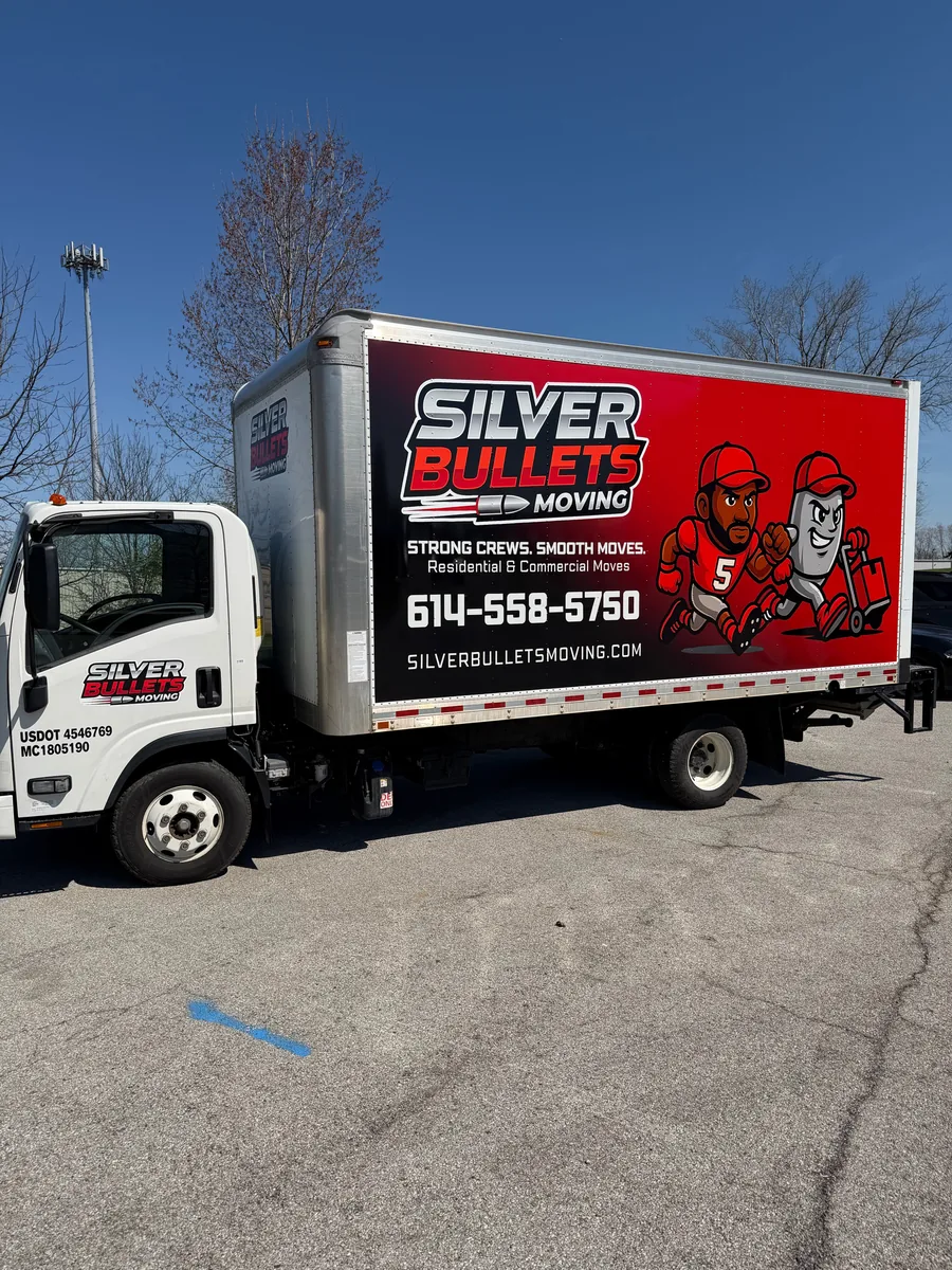 Moving company box truck with printed box graphics