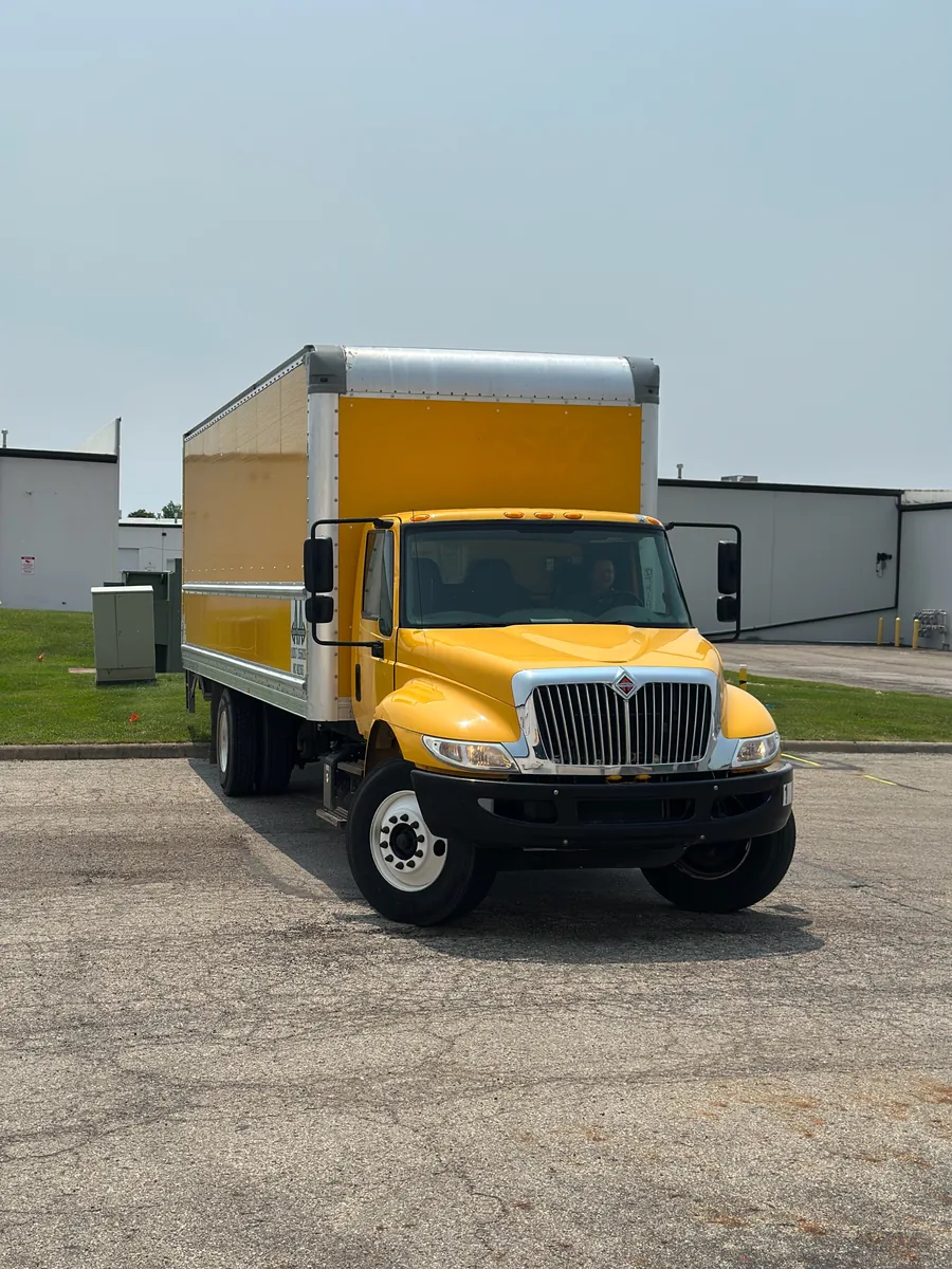 Yellow box truck before its graphics