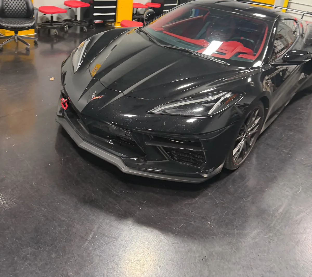 Black C8 Corvette before its stripe