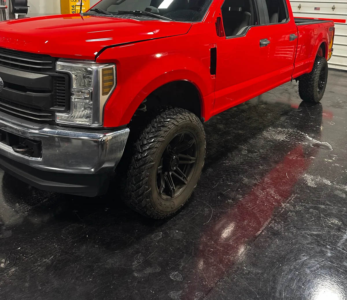 Red Ford F-250 pickup before its wrap