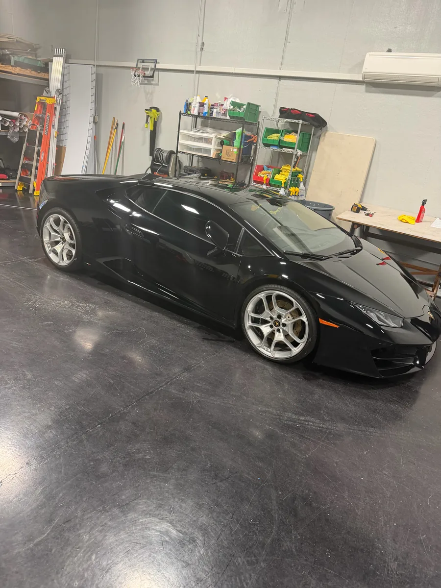 Black Lamborghini Huracan before its color change wrap