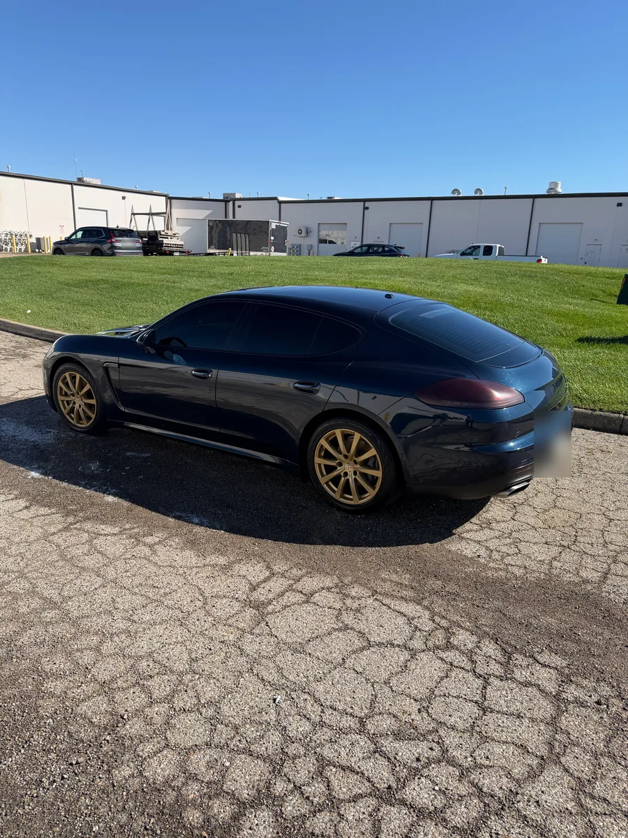 Navy Porsche Panamera before its color change wrap