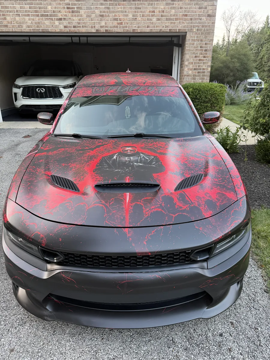 Dodge Charger in a gray and red splatter print wrap