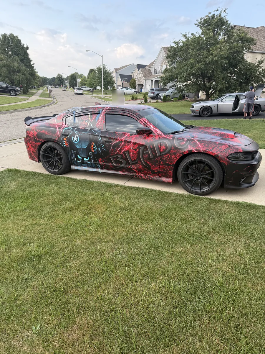 Dodge Charger in a red and black splatter print wrap
