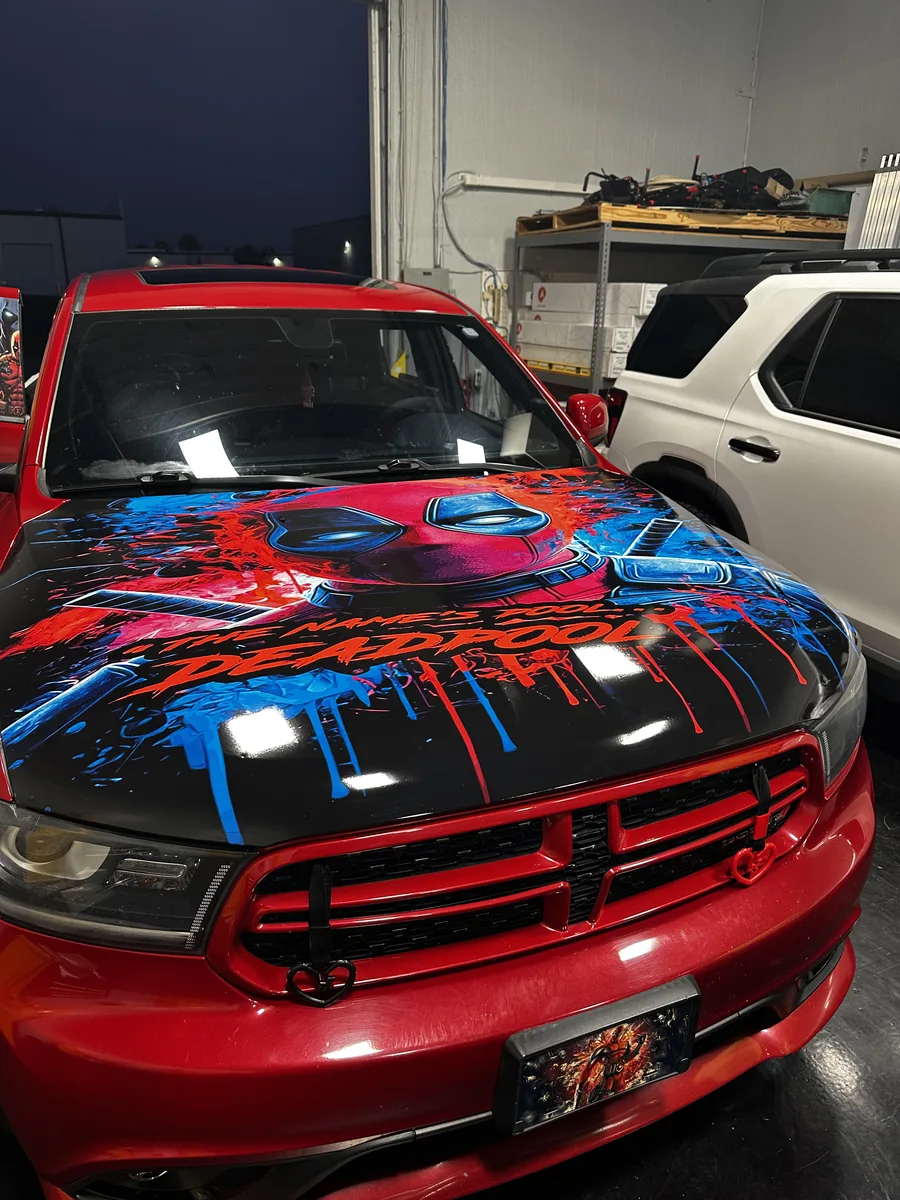 Dodge Durango with a drip hood graphic
