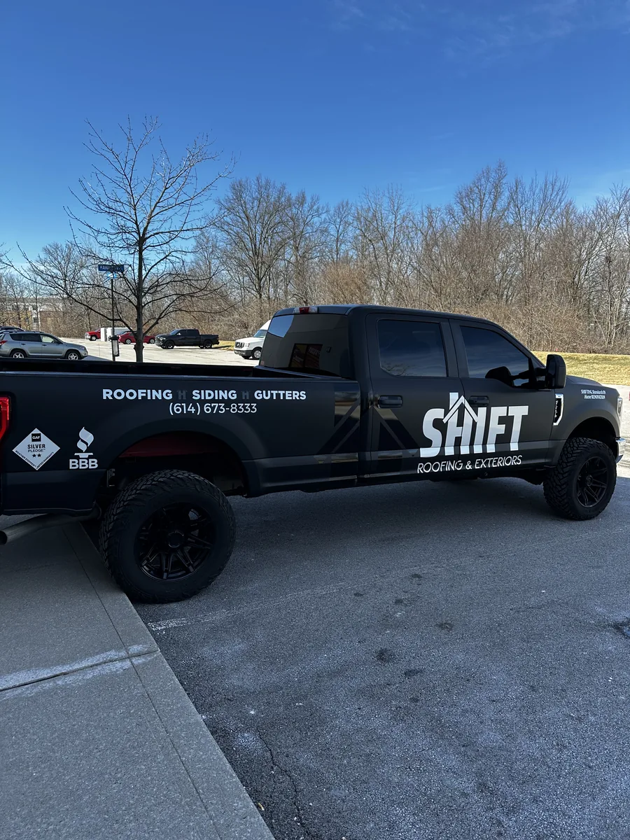 Roofing company Ford F-250 with door lettering