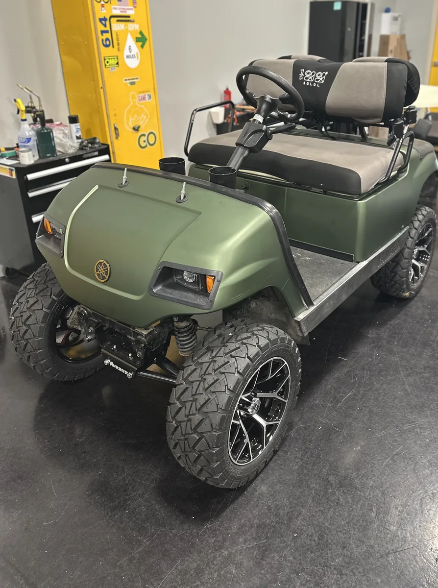 Golf cart in a green wrap