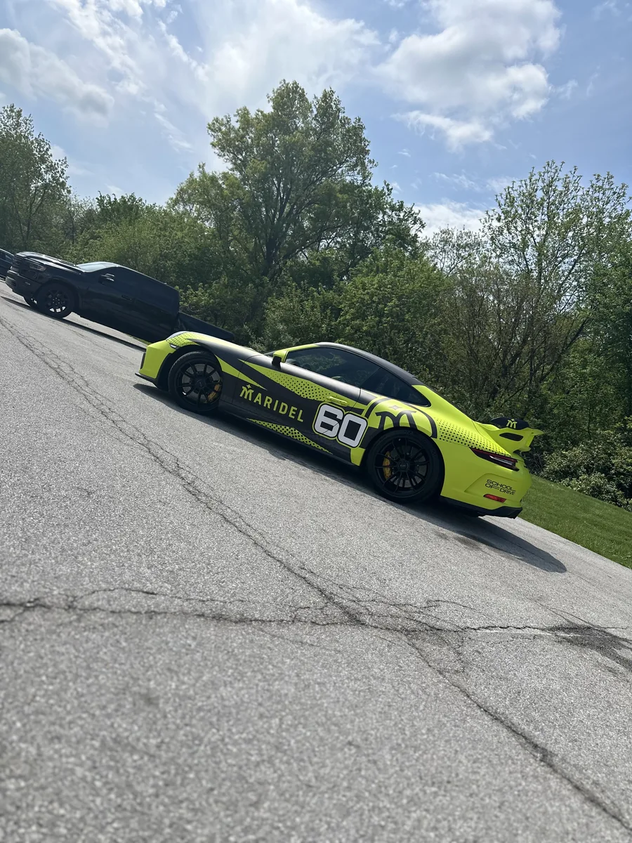 Ford Mustang with neon race livery and number 60