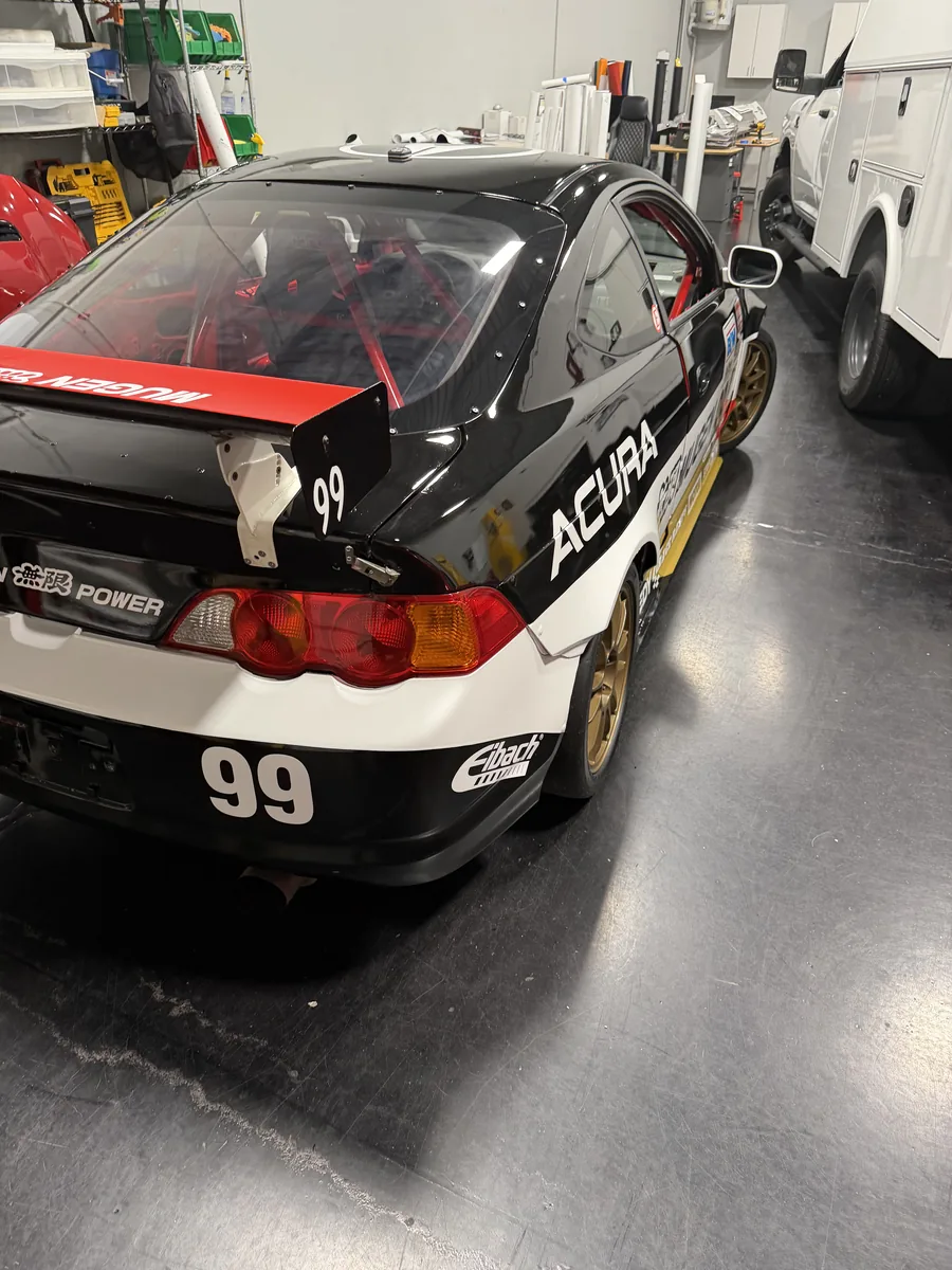 Acura race car with number 99 livery