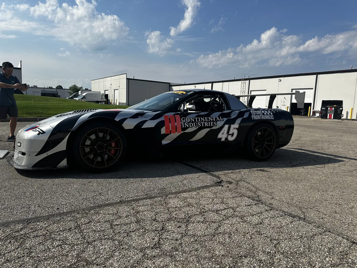 Corvette race car with zebra livery and number 45