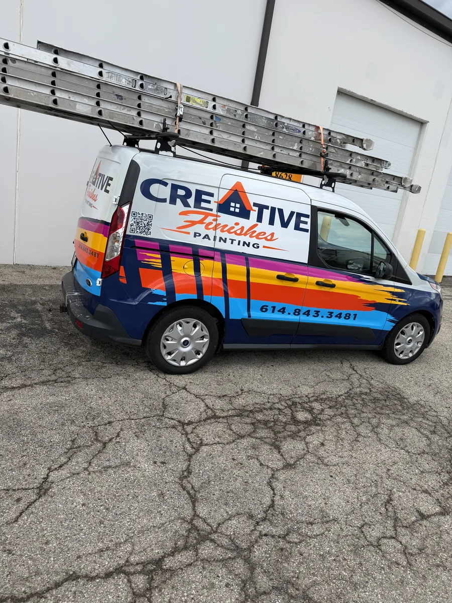 Painting contractor van with branded graphics